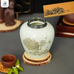 Hũ trà gốm Khổng Tước Bạch Ngọc nắp bạc