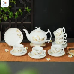 Bộ ấm chén Hoa Mộc Lan dáng trăng khuyết