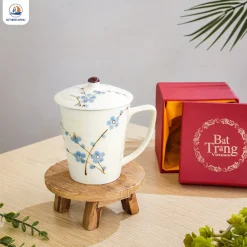 Cốc sứ Bát Tràng họa tiết đào xanh