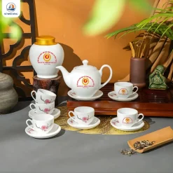 Bộ ấm chén hoa đào in logo theo yêu cầu